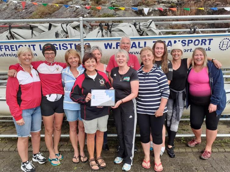 Members of the Fishguard and Goodwick Jemima Rowing Club with Angela Miles.